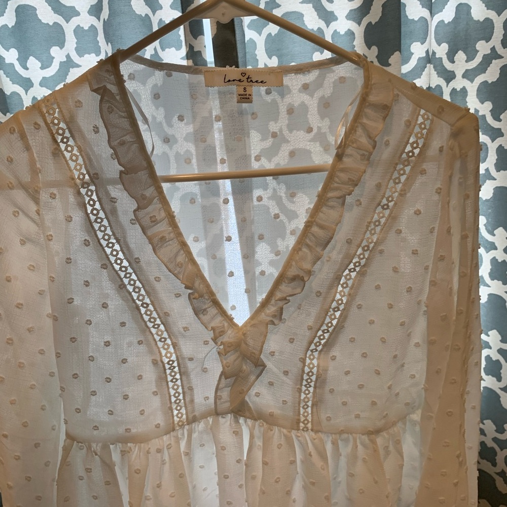 White peplum top